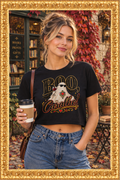 Woman wearing the crop top in a fall courtyard inside the gold frame